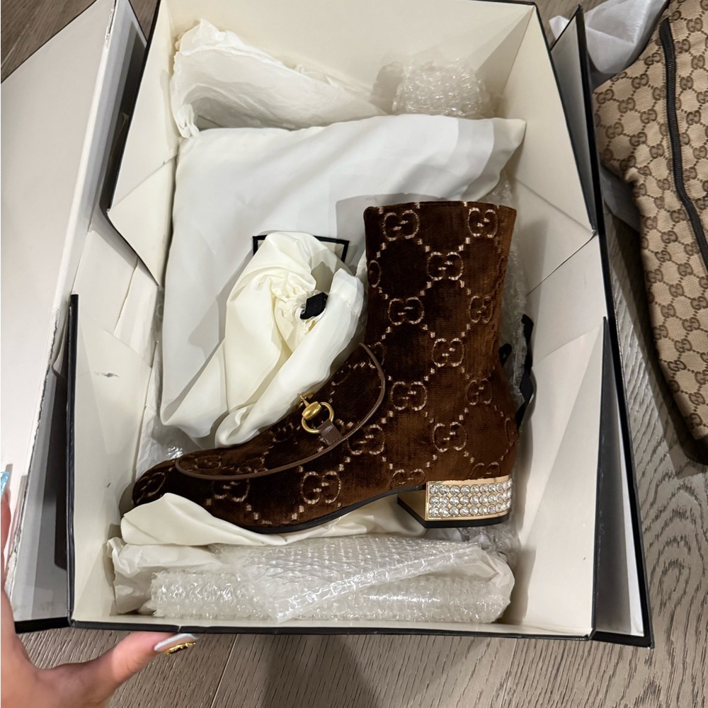 Gucci Brown and Gold Heeled Boots with Monogram Pattern